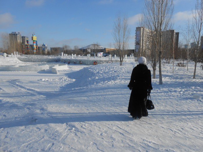 Woman in snow in Kazakhstan